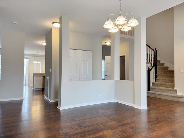 1214 Eric Ln, Lake Zurich, IL 60047 - unfurnished living room with a chandelier, stairway, and dark wood finished floors