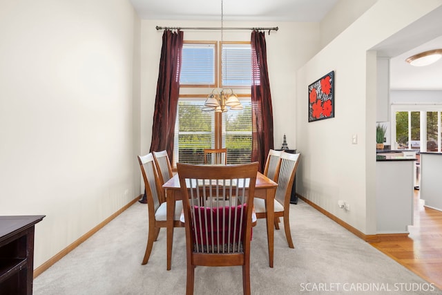 908 Pimpernel Ct, Naperville, IL 60540 - dining space featuring a chandelier and baseboards