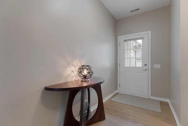 13315 Red Alder Ave, Huntley, IL 60142 - doorway with light wood-style flooring and baseboards