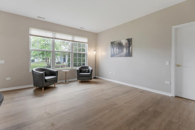 13315 Red Alder Ave, Huntley, IL 60142 - sitting room with wood finished floors and baseboards