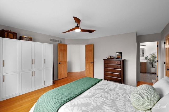 25048 Michele Dr, Plainfield, IL 60544 - bedroom with light wood-type flooring and ceiling fan