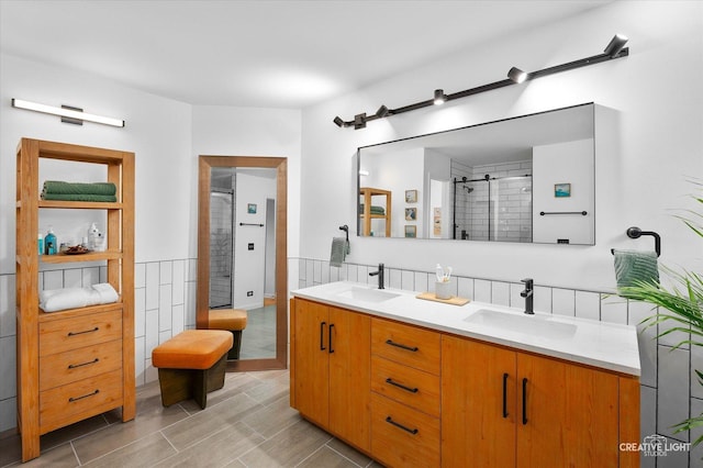 25048 Michele Dr, Plainfield, IL 60544 - full bathroom with a shower stall, double vanity, and wood tiled floors