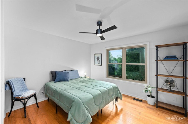 25048 Michele Dr, Plainfield, IL 60544 - bedroom with wood finished floors and a ceiling fan