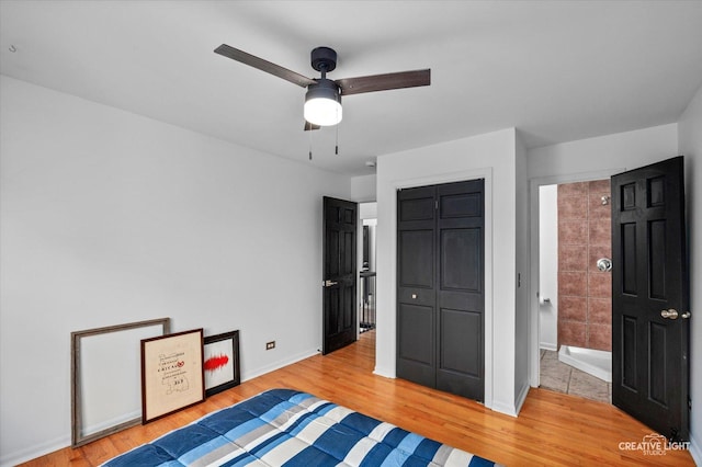 25048 Michele Dr, Plainfield, IL 60544 - unfurnished bedroom with light wood finished floors and ceiling fan