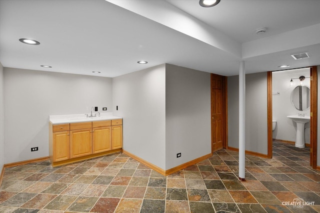25048 Michele Dr, Plainfield, IL 60544 - bathroom featuring stone finish flooring, recessed lighting, and vanity