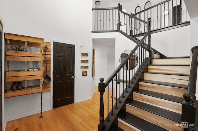 25048 Michele Dr, Plainfield, IL 60544 - foyer entrance with wood finished floors, stairway, and a towering ceiling