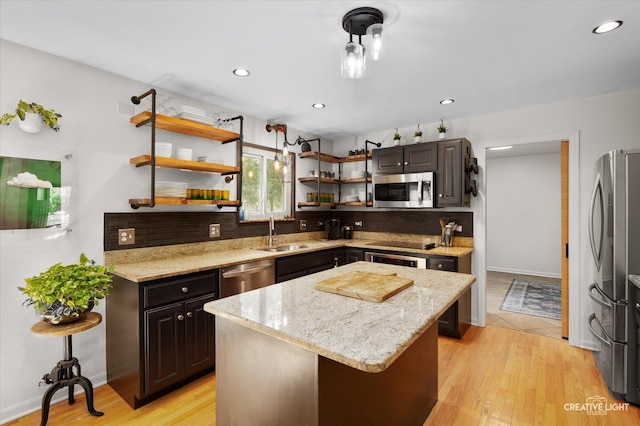 25048 Michele Dr, Plainfield, IL 60544 - kitchen with stainless steel appliances, backsplash, open shelves, light wood-type flooring, and recessed lighting
