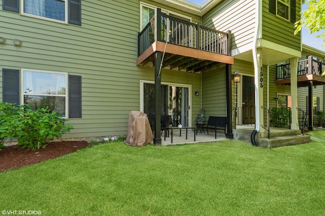 1505 Raymond Dr Unit 103, Naperville, IL 60563 - back of property with a balcony, a lawn, and a patio