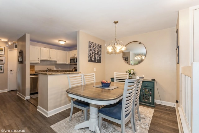 1505 Raymond Dr Unit 103, Naperville, IL 60563 - dining area featuring a chandelier and dark wood-style floors