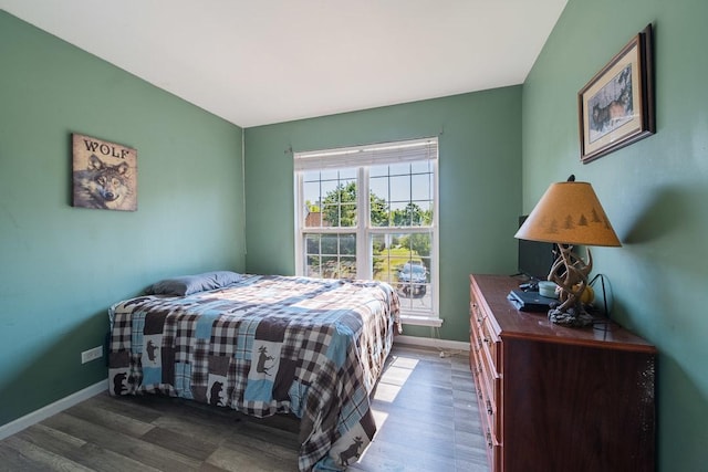 2211 Aspen Dr, Woodstock, IL 60098 - bedroom with wood finished floors and baseboards