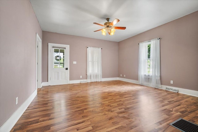605 W 2nd N St, Wenona, IL 61377 - empty room featuring wood finished floors and ceiling fan
