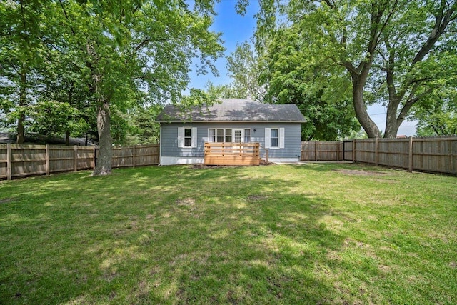 605 W 2nd N St, Wenona, IL 61377 - rear view of house with a fenced backyard