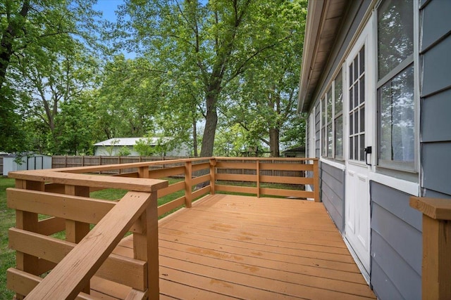 605 W 2nd N St, Wenona, IL 61377 - wooden terrace with a fenced backyard and a storage shed