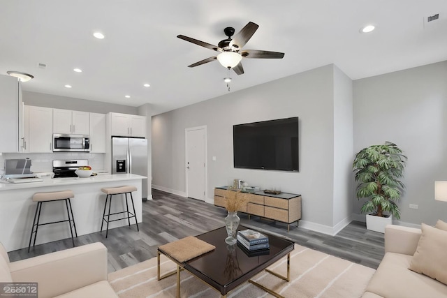 6349 S Maryland Ave, Chicago, IL 60637 - living area featuring recessed lighting, ceiling fan, and wood finished floors