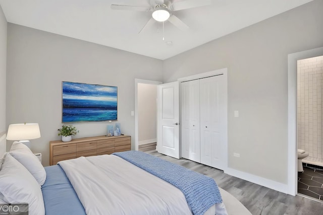 6349 S Maryland Ave, Chicago, IL 60637 - bedroom with wood finished floors, a closet, ensuite bath, and a ceiling fan