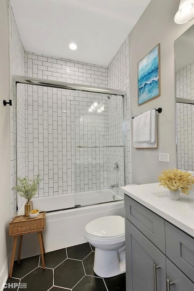 6349 S Maryland Ave, Chicago, IL 60637 - bathroom featuring vanity, shower / bath combination with glass door, and tile patterned flooring