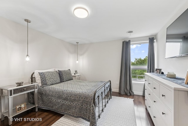 424 Park Ave Unit 604, River Forest, IL 60305 - bedroom featuring dark wood-style flooring and baseboards