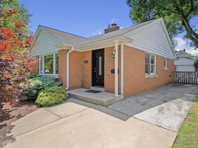 610 S Madison Ave, La Grange, IL 60525 - ranch-style home with brick siding and a chimney