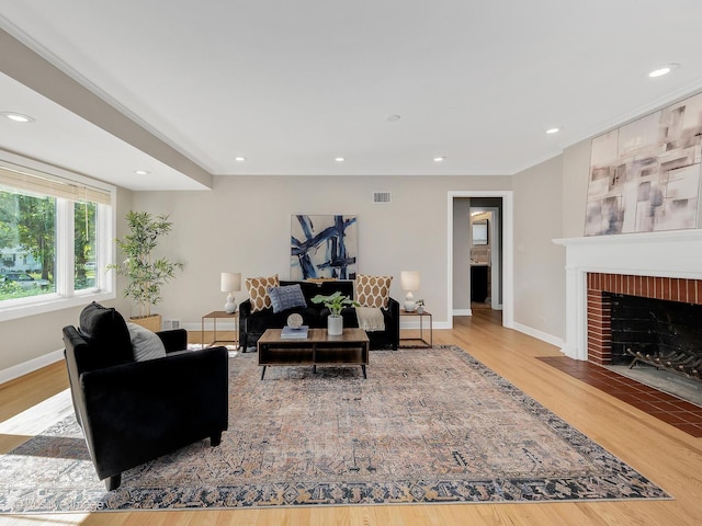 610 S Madison Ave, La Grange, IL 60525 - living area with wood finished floors, a fireplace, and recessed lighting