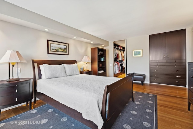 1110 N Lake Shore Dr Unit 20N, Chicago, IL 60611 - bedroom with wood finished floors, recessed lighting, a spacious closet, and a closet