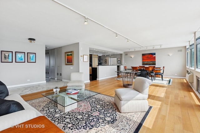 1110 N Lake Shore Dr Unit 20N, Chicago, IL 60611 - living area with track lighting and light wood finished floors