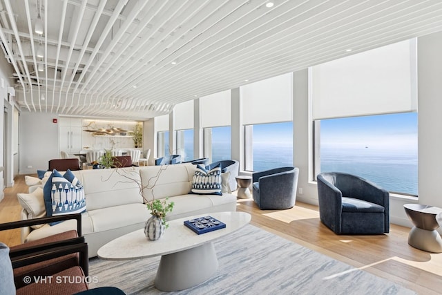 1110 N Lake Shore Dr Unit 20N, Chicago, IL 60611 - living area with wood finished floors and a water view