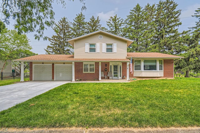1322 E Thurston Dr, Palatine, IL 60074 - tri-level home with a garage, concrete driveway, covered porch, brick siding, and roof with shingles