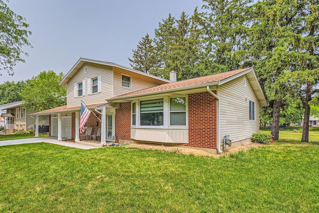 1322 E Thurston Dr, Palatine, IL 60074 - view of front of property featuring driveway, a front lawn, and a garage
