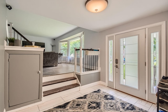1322 E Thurston Dr, Palatine, IL 60074 - entryway with stairway and baseboards