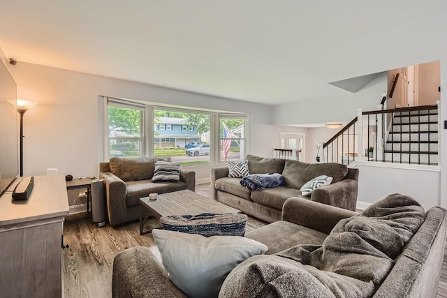1322 E Thurston Dr, Palatine, IL 60074 - living room featuring light wood-style flooring and stairway