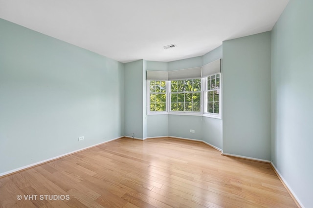 1503 Oak Ave Unit 312, Evanston, IL 60201 - empty room featuring wood finished floors and baseboards
