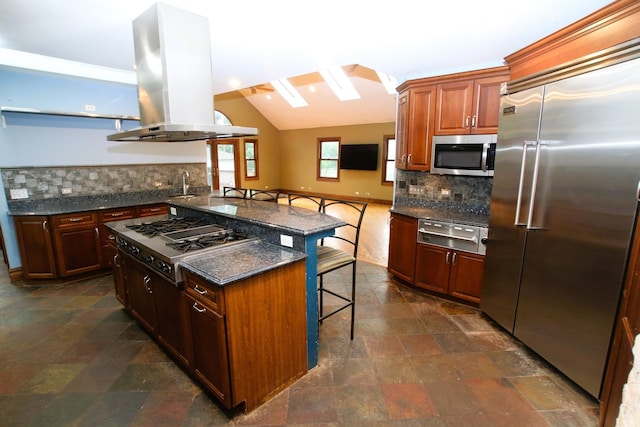 314 N Maple St, Itasca, IL 60143 - kitchen with stainless steel appliances, a kitchen breakfast bar, a warming drawer, island range hood, and tasteful backsplash