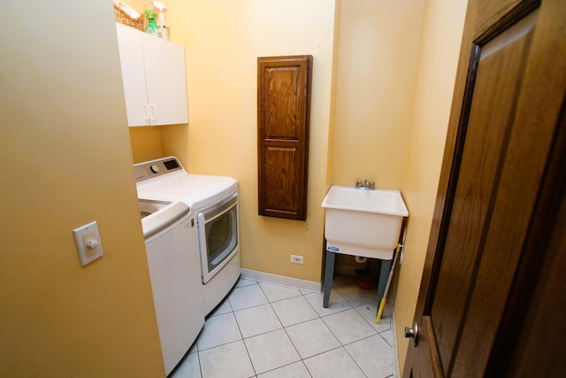 314 N Maple St, Itasca, IL 60143 - washroom with washing machine and dryer, cabinet space, and light tile patterned floors