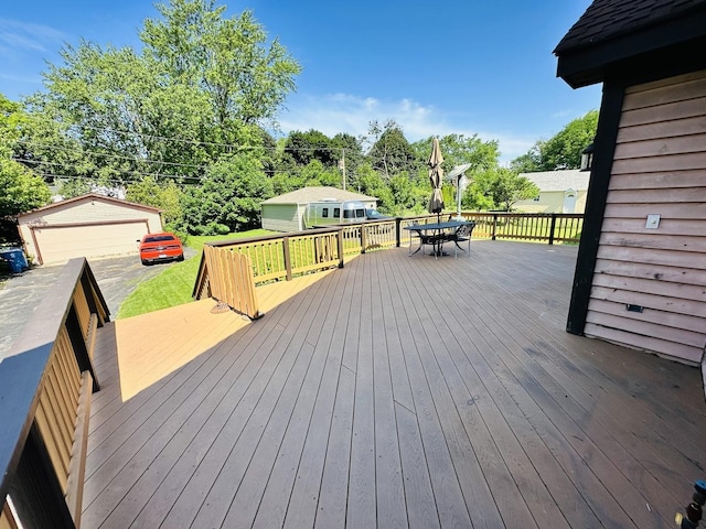 314 N Maple St, Itasca, IL 60143 - wooden deck with outdoor dining space and an outdoor structure