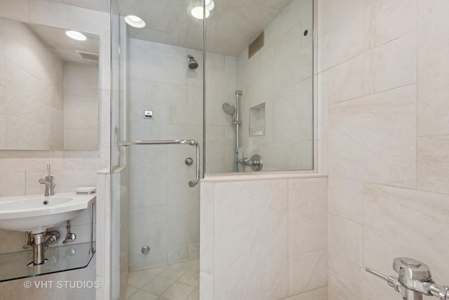 2970 N Lake Shore Dr Unit 7B-7C, Chicago, IL 60657 - full bathroom featuring tile walls and a stall shower