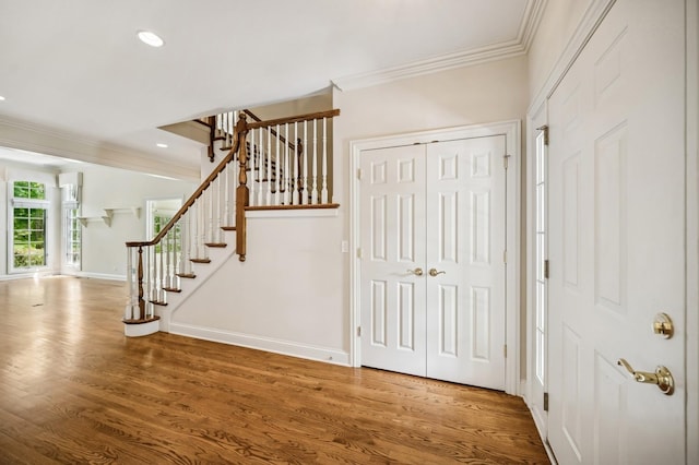 775 S Camelot Ct, Lake Forest, IL 60045 - entryway with ornamental molding, wood finished floors, stairs, and recessed lighting