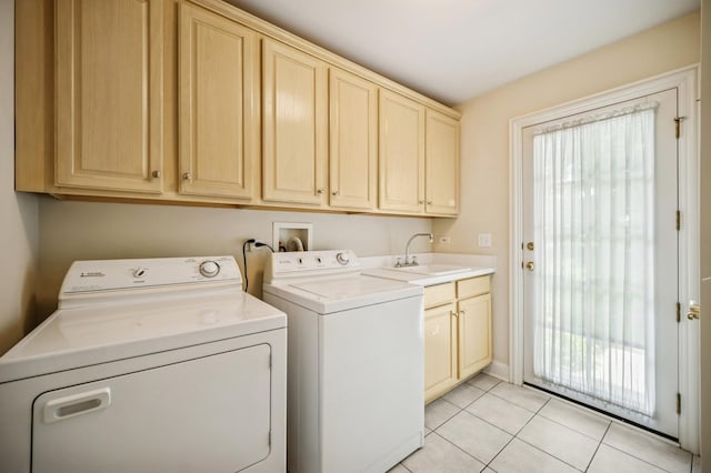 775 S Camelot Ct, Lake Forest, IL 60045 - laundry area with washing machine and dryer, cabinet space, plenty of natural light, and light tile patterned floors
