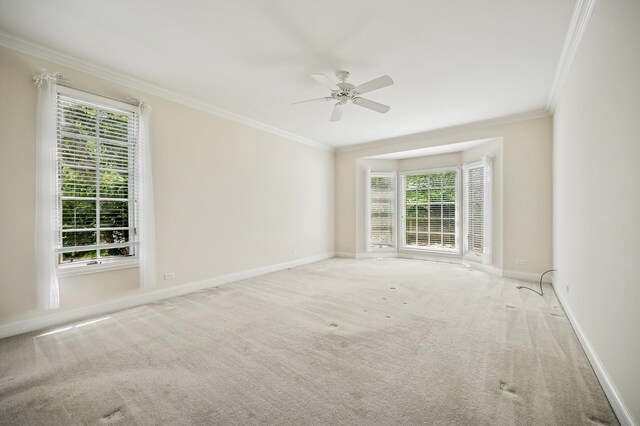 775 S Camelot Ct, Lake Forest, IL 60045 - carpeted empty room with crown molding, a ceiling fan, and healthy amount of natural light