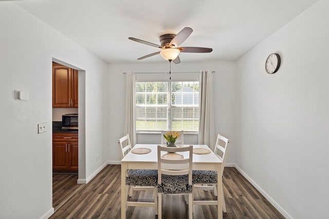 2011 University Dr, Naperville, IL 60565 - dining area with ceiling fan and dark wood-style flooring