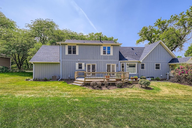 201 S Wulff St, Cary, IL 60013 - rear view of house with a deck, board and batten siding, a shingled roof, and a yard