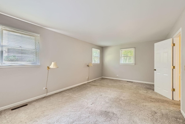 201 S Wulff St, Cary, IL 60013 - spare room featuring carpet floors