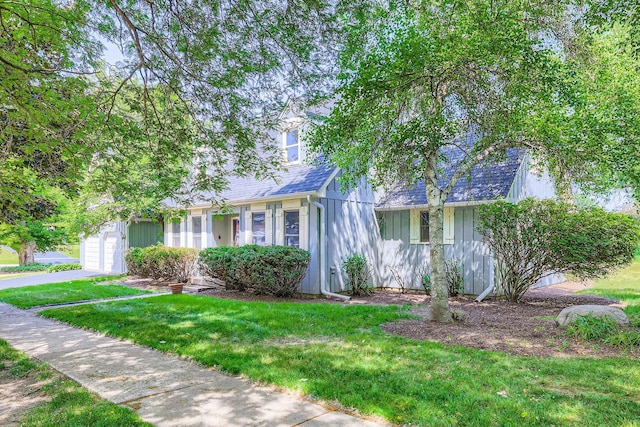 201 S Wulff St, Cary, IL 60013 - obstructed view of property with a front yard and a garage