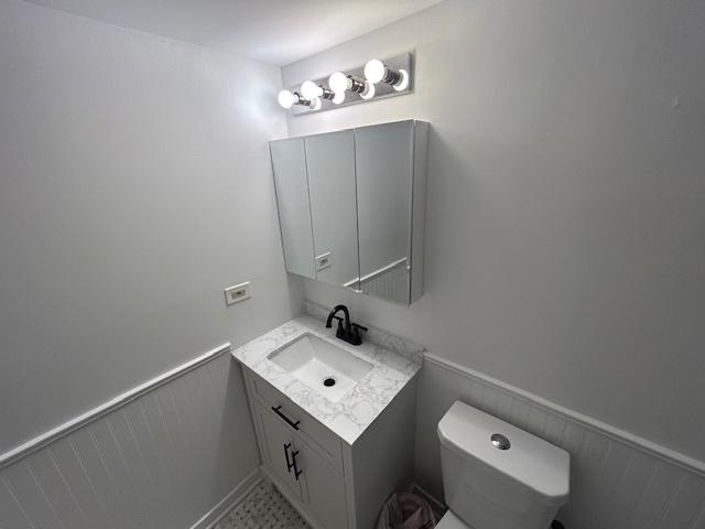 9098 Terrace Dr Unit 3E, Niles, IL 60714 - half bath with vanity and toilet