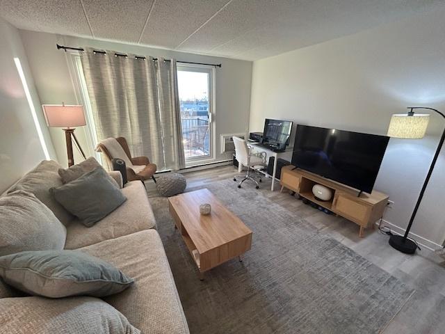 9098 Terrace Dr Unit 3E, Niles, IL 60714 - living area with wood finished floors and an office area