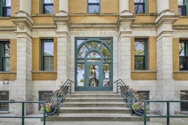 2035 W Charleston St Unit 205, Chicago, IL 60647 - doorway to property with stone siding and brick siding