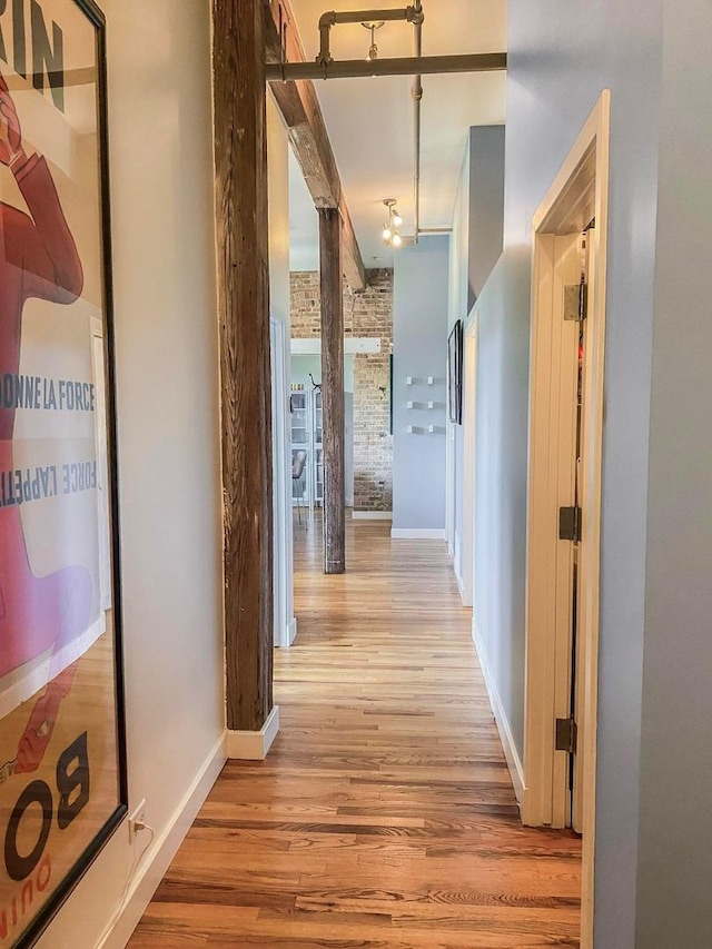 2035 W Charleston St Unit 205, Chicago, IL 60647 - hall with light wood-style flooring and baseboards