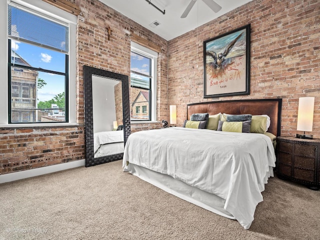 2035 W Charleston St Unit 205, Chicago, IL 60647 - bedroom featuring carpet, brick wall, and ceiling fan
