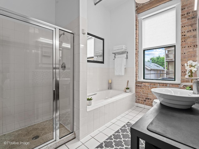 2035 W Charleston St Unit 205, Chicago, IL 60647 - full bath featuring a bath, tile patterned flooring, a stall shower, and vanity