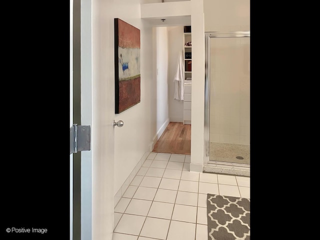 2035 W Charleston St Unit 205, Chicago, IL 60647 - bathroom with a shower stall and tile patterned flooring