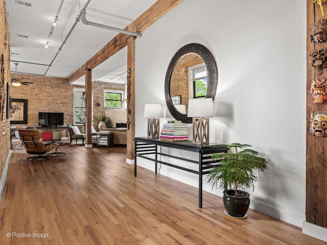 2035 W Charleston St Unit 205, Chicago, IL 60647 - living area featuring wood finished floors and track lighting